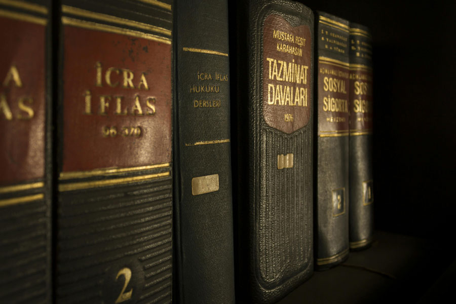 Close-up of law books in Turkish on a shelf.